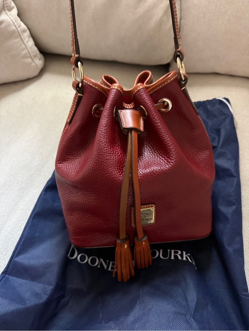 Dooney & Bourke Burgundy Leather Drawstring Bucket Bag with Tan Trim